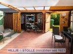 Gepflegtes 4-Parteienhaus in ruhiger Wohnsiedlung in Westerstede! - Terrasse EG links